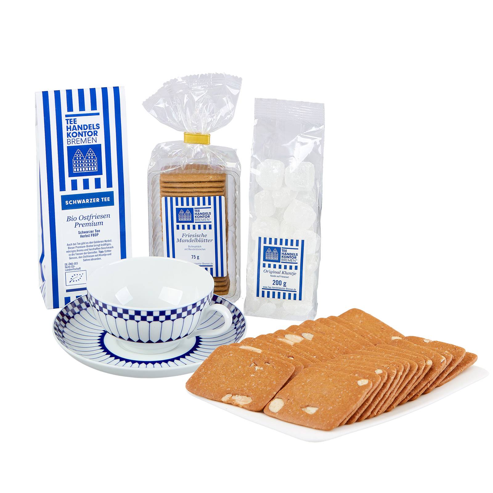 Blau-weiße Teetüte, Tasse blau-weiß, Mandelblätter und Kluntje mit Logo TEE-HANDELS-KONTOR BREMEN